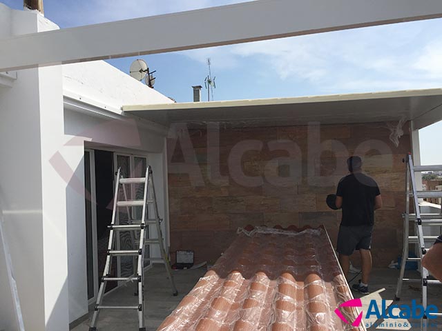 Cerramiento de ático con cortinas de cristal en Huelva