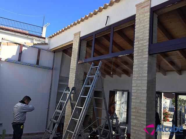 Cortina de cristal para cerramiento de patio en El Ronquillo, Sevilla